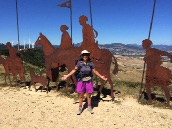 Metal sculpture of pilgrims through the ages